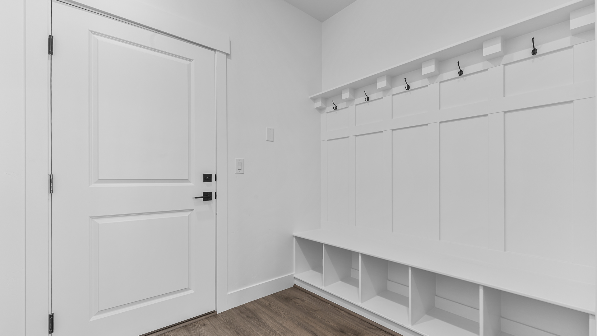 Spacious entryway with mud room