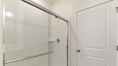 white cabinet bathroom with a shower