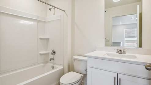white cabinet bathroom