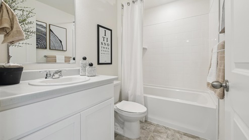white bathroom with tub