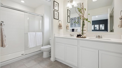 bathroom with white cabinet