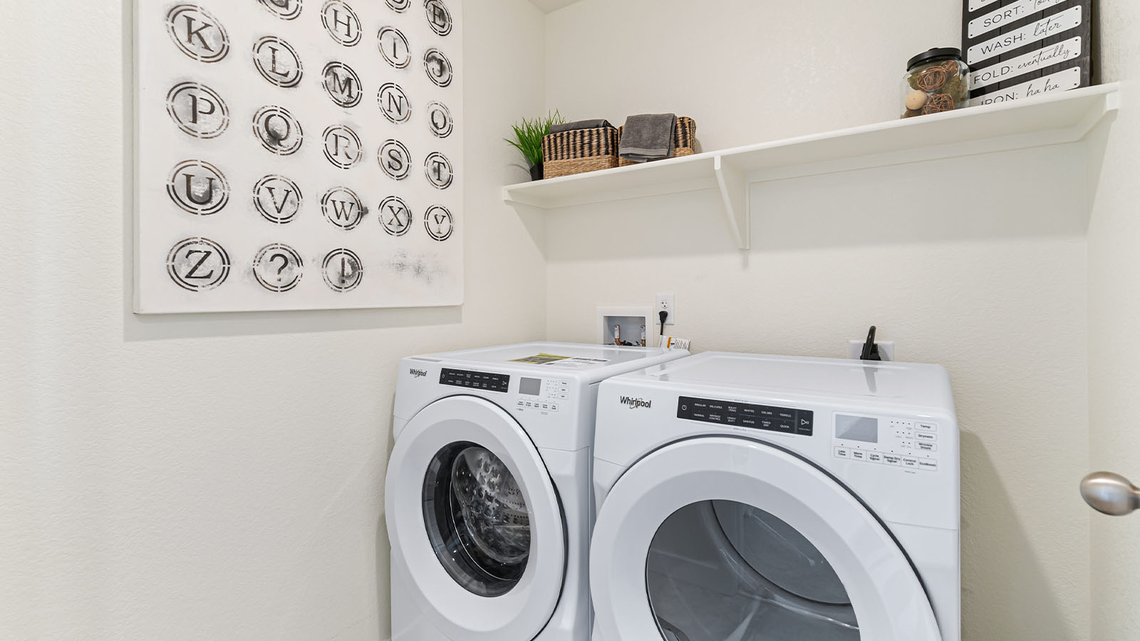 Alamosa floor plan at Horizon Uptown provides a dedicated convenient laundry room with built-in shelf above near linen closet