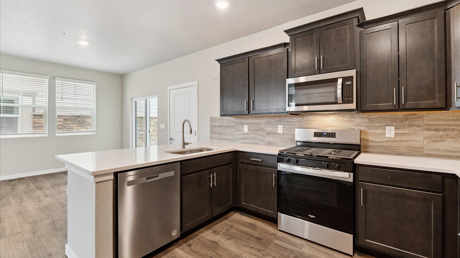 kitchen with wood cabinets in new home