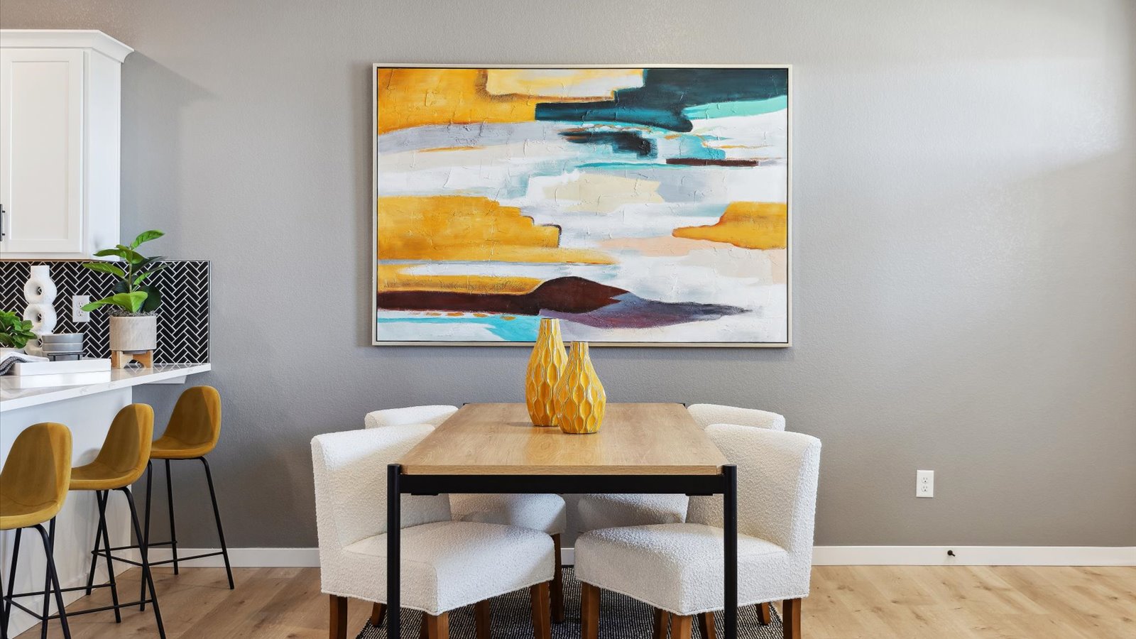 Dining room in open concept main floor layout in new D.R. Horton home in Sky Ranch
