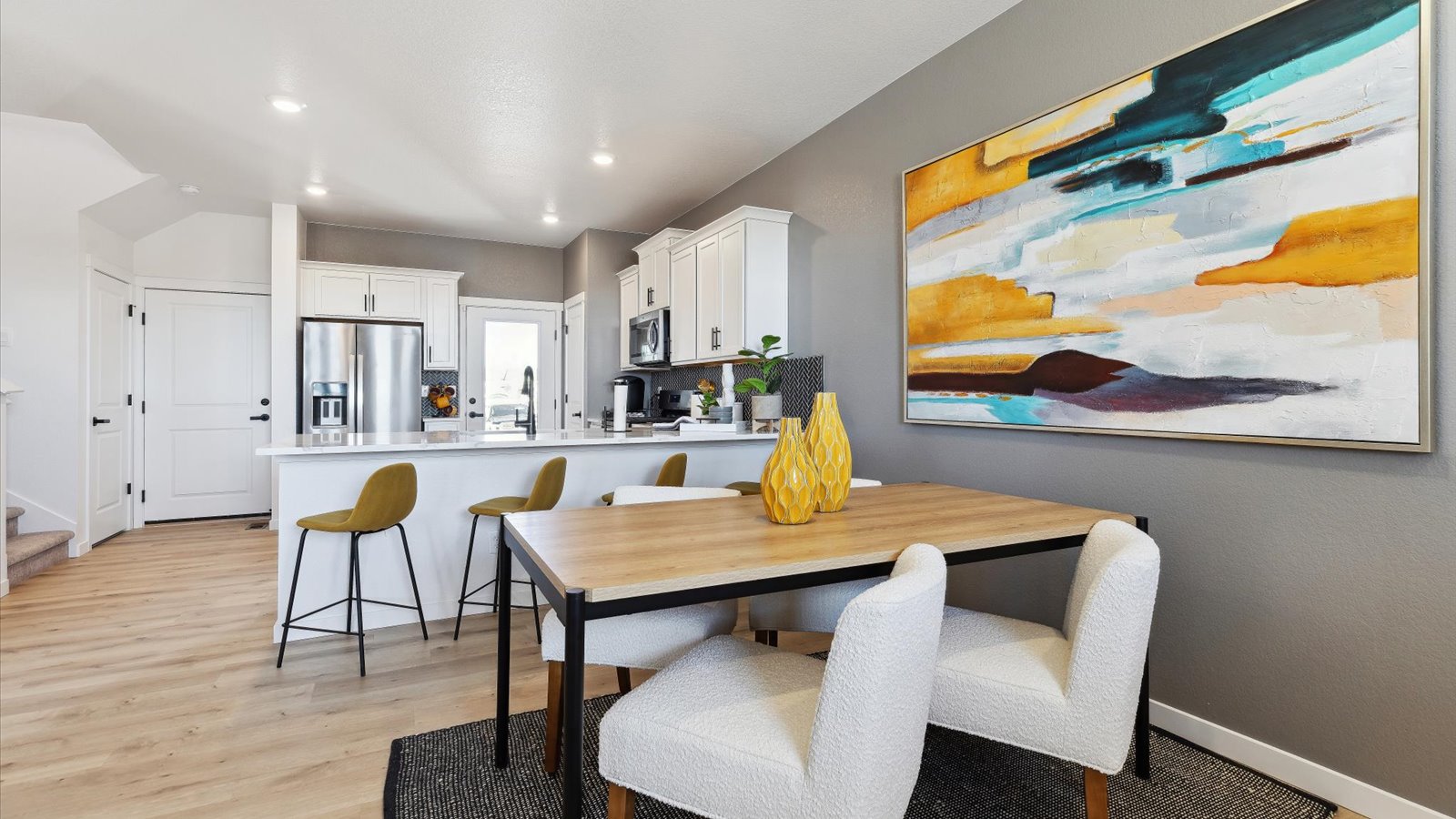 Open concept main floor living in new D.R. Horton home at Sky Ranch Community