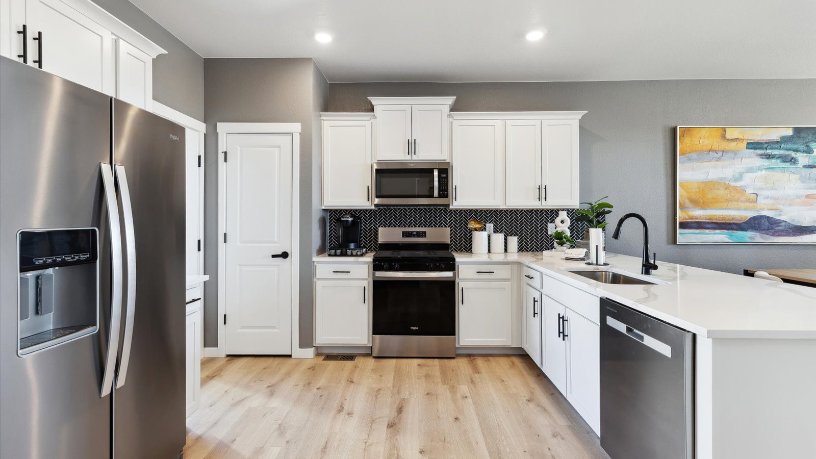 Spacious kitchen in new home community in Watkins Colorado