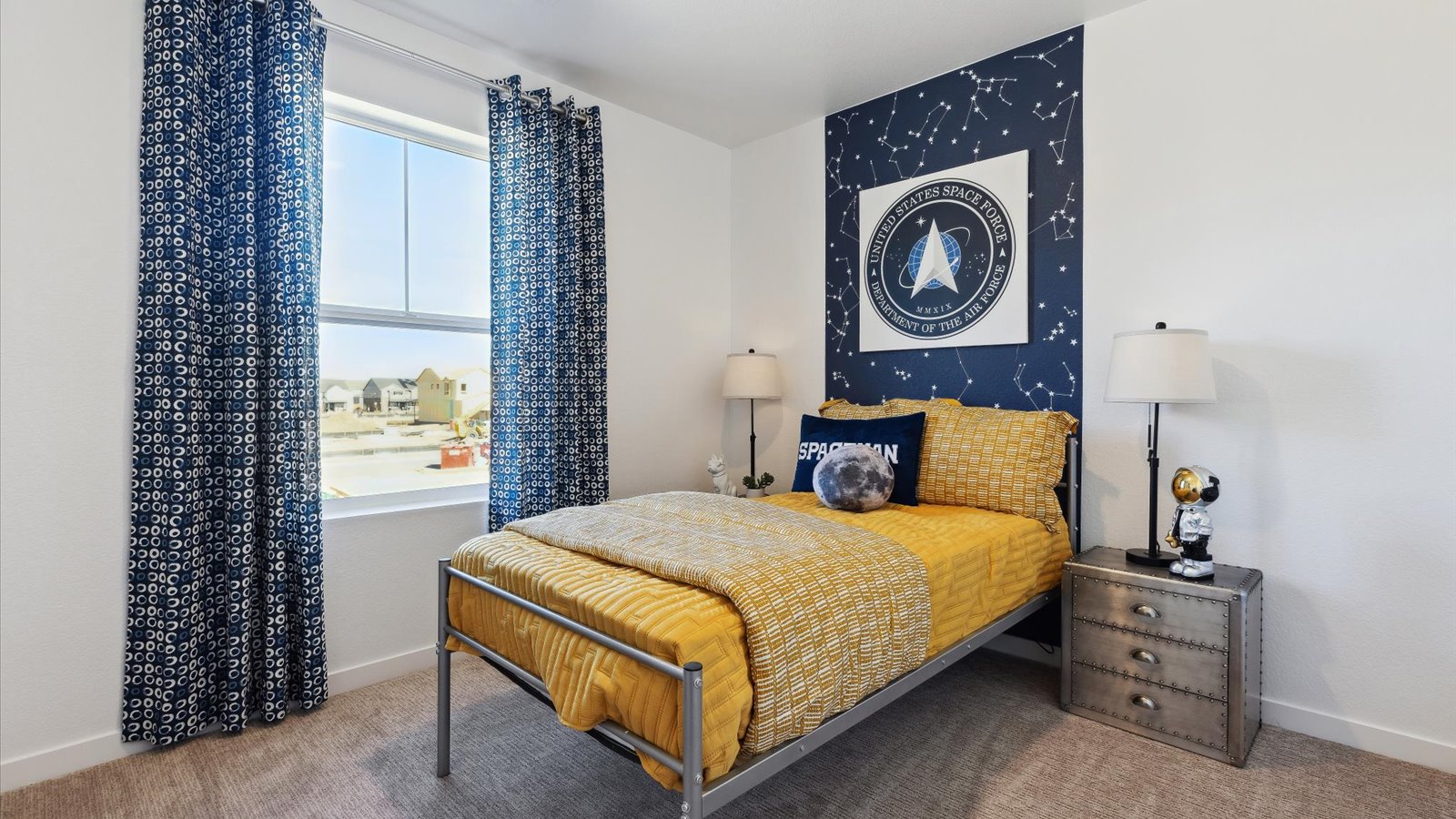 Secondary bedroom with large windows in new D.R. Horton home in Watkins Colorado