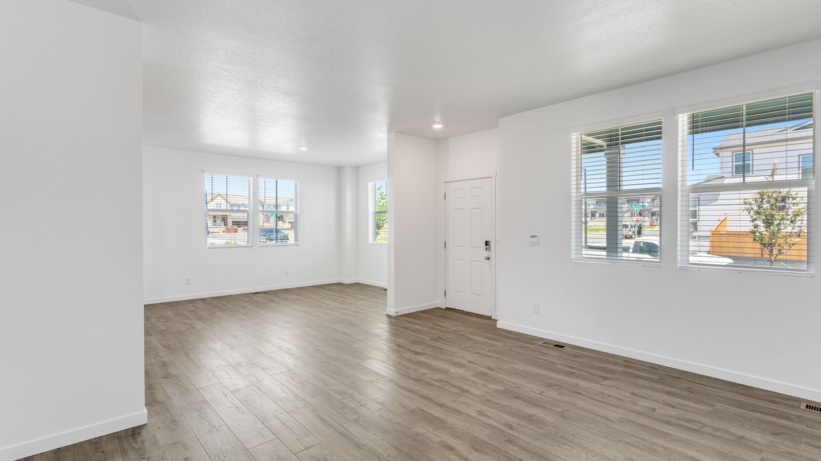 Open concept living in new home in Watkins Colorado