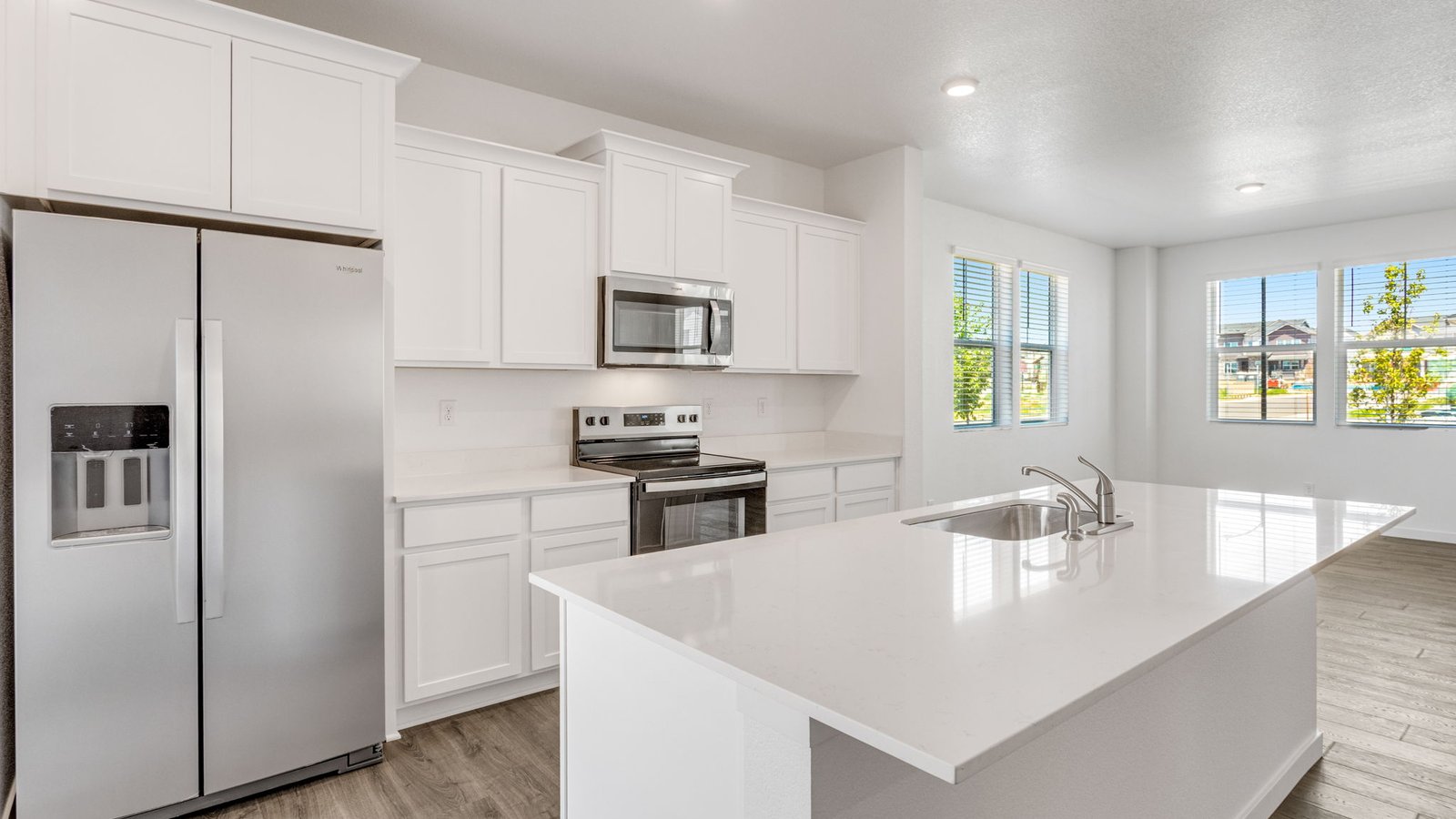 Spacious kitchen island perfect for entertaining in new home in Sky Ranch Community
