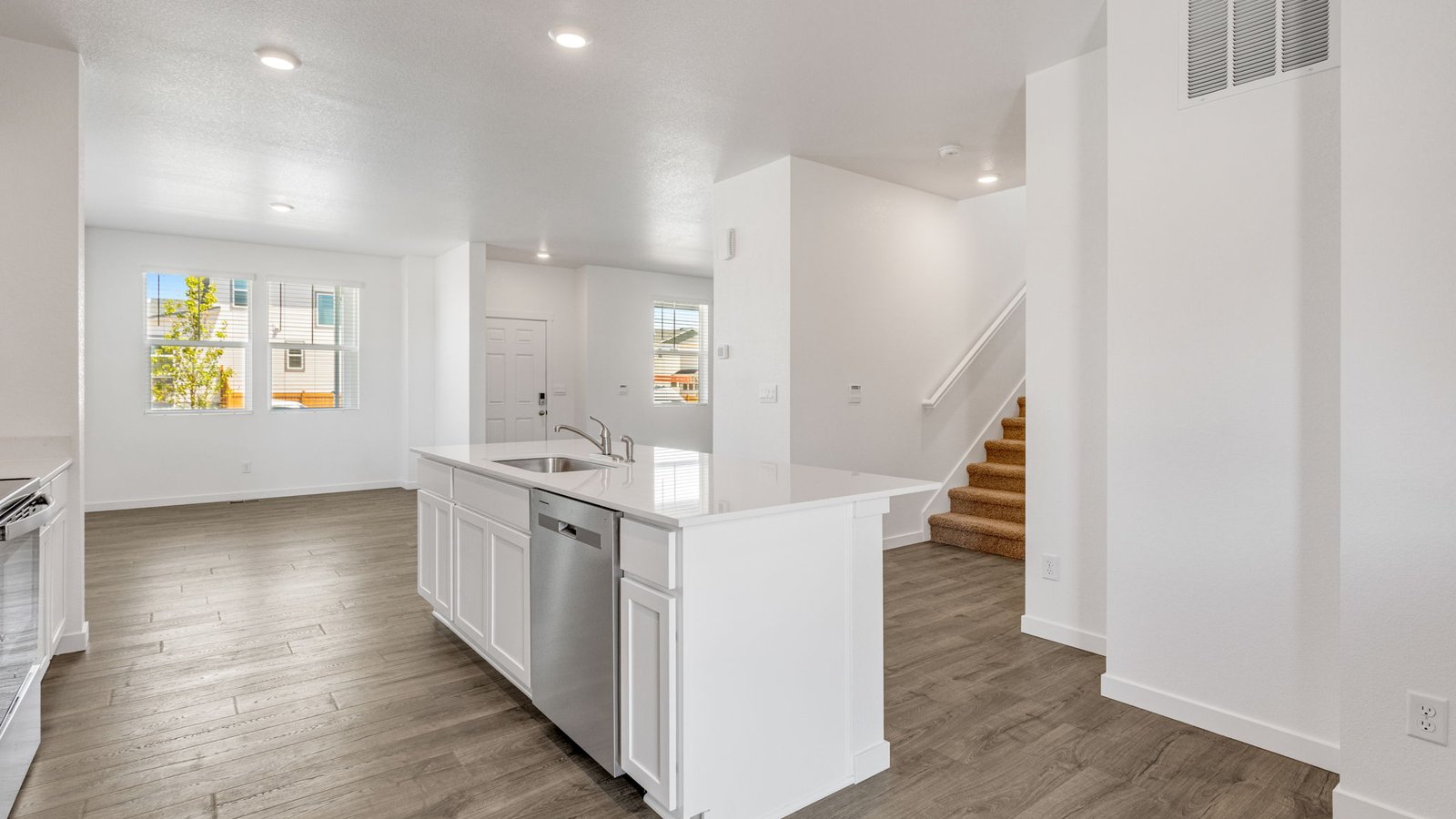 Open concept living in new home in Watkins Colorado