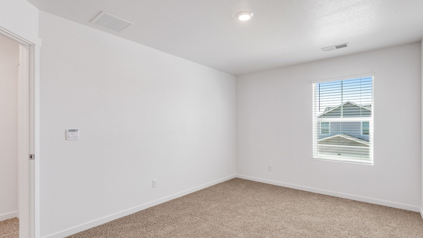 Secondary bedroom in new Elbert floor plan at Sky Ranch Community