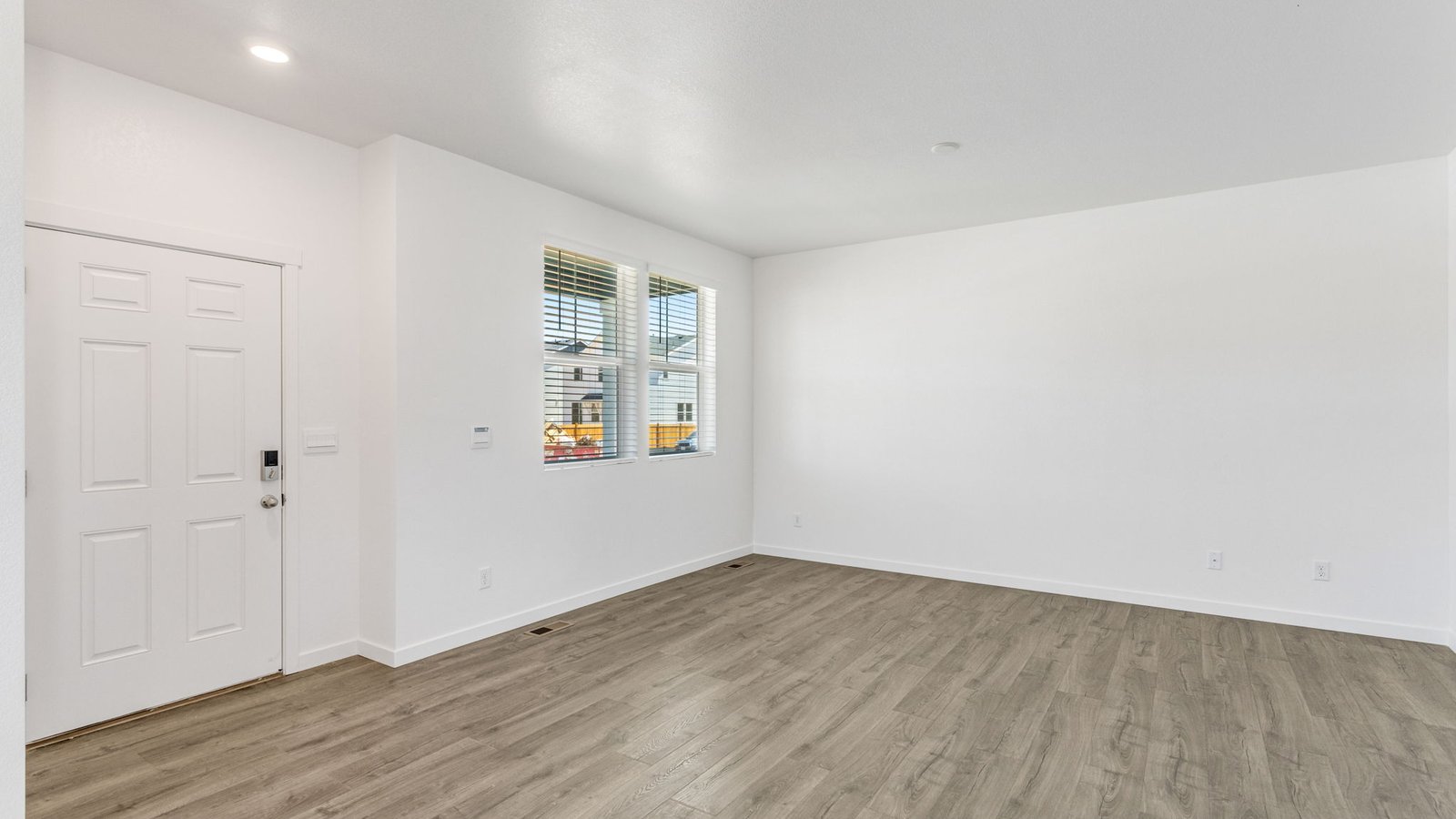 Versatile entry way space in new home at Sky Ranch Community in Watkins Colorado