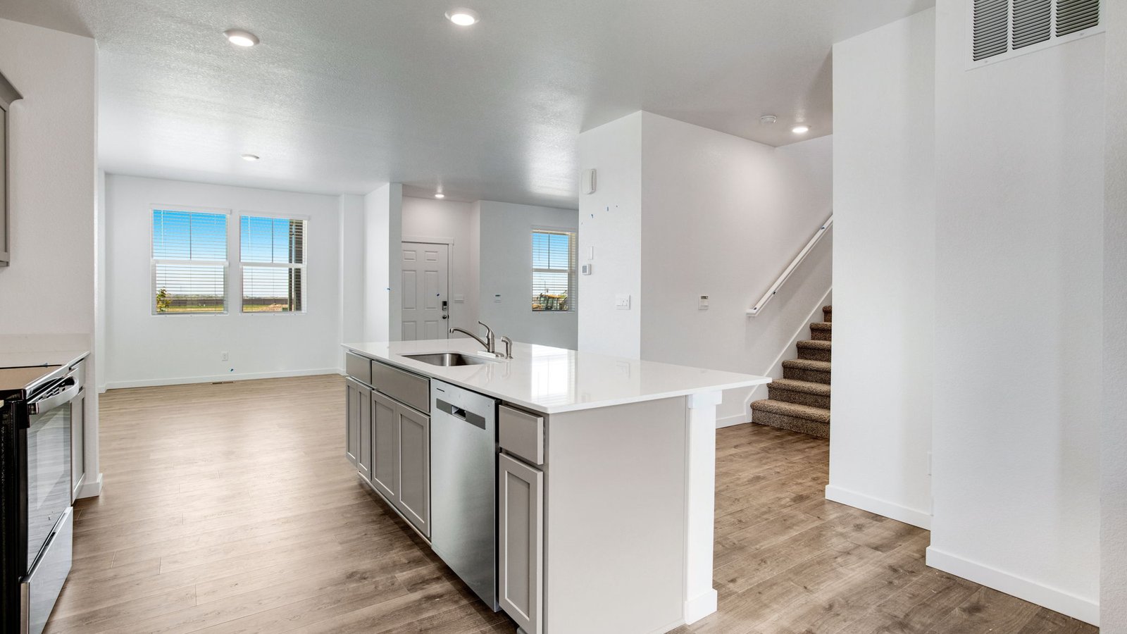 Open concept home in new home community Sky Ranch