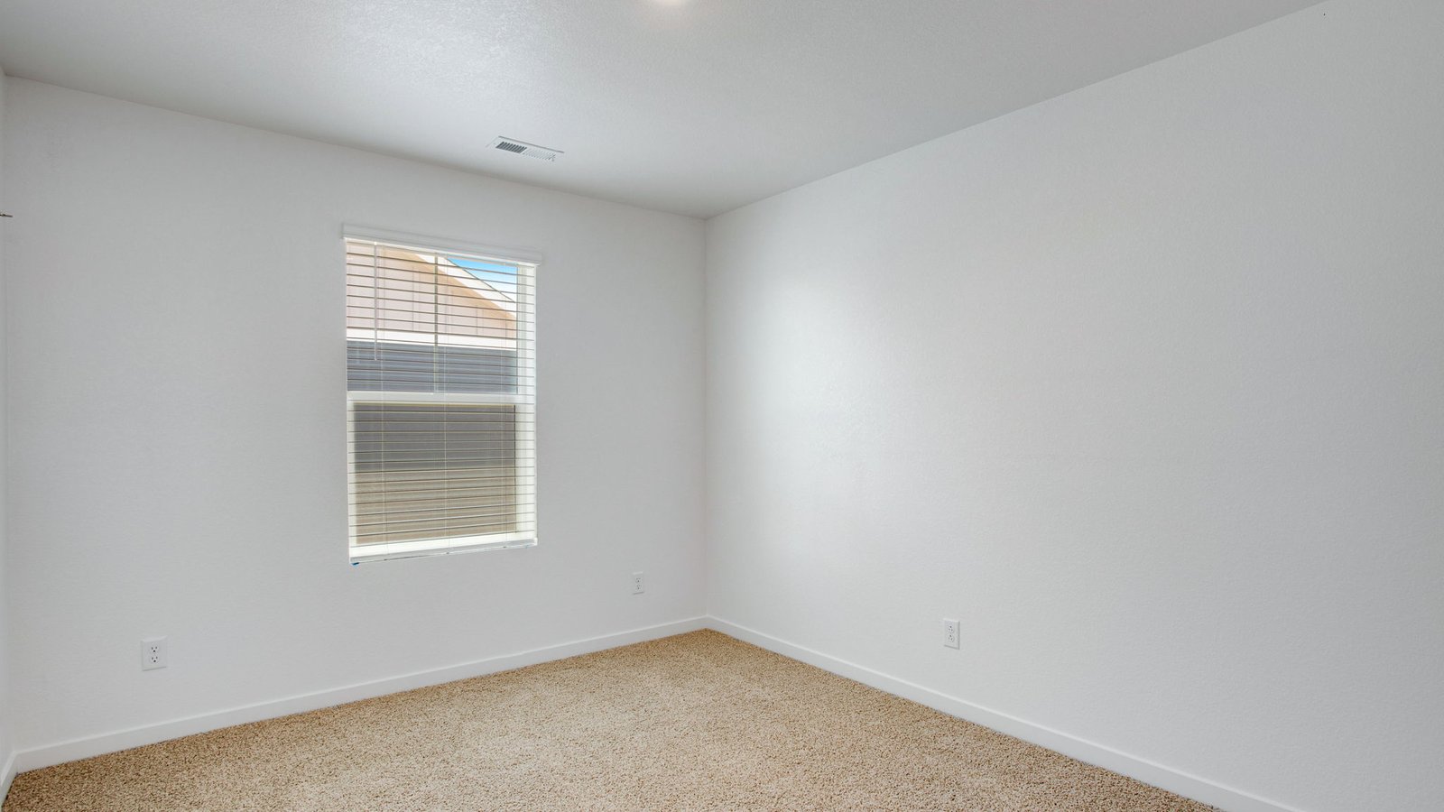 Secondary bedroom in new home community near Aurora Colorado