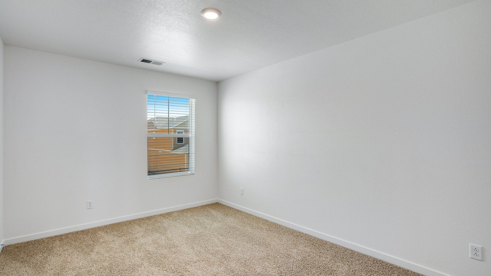 Secondary bedroom in new home community near Aurora Colorado