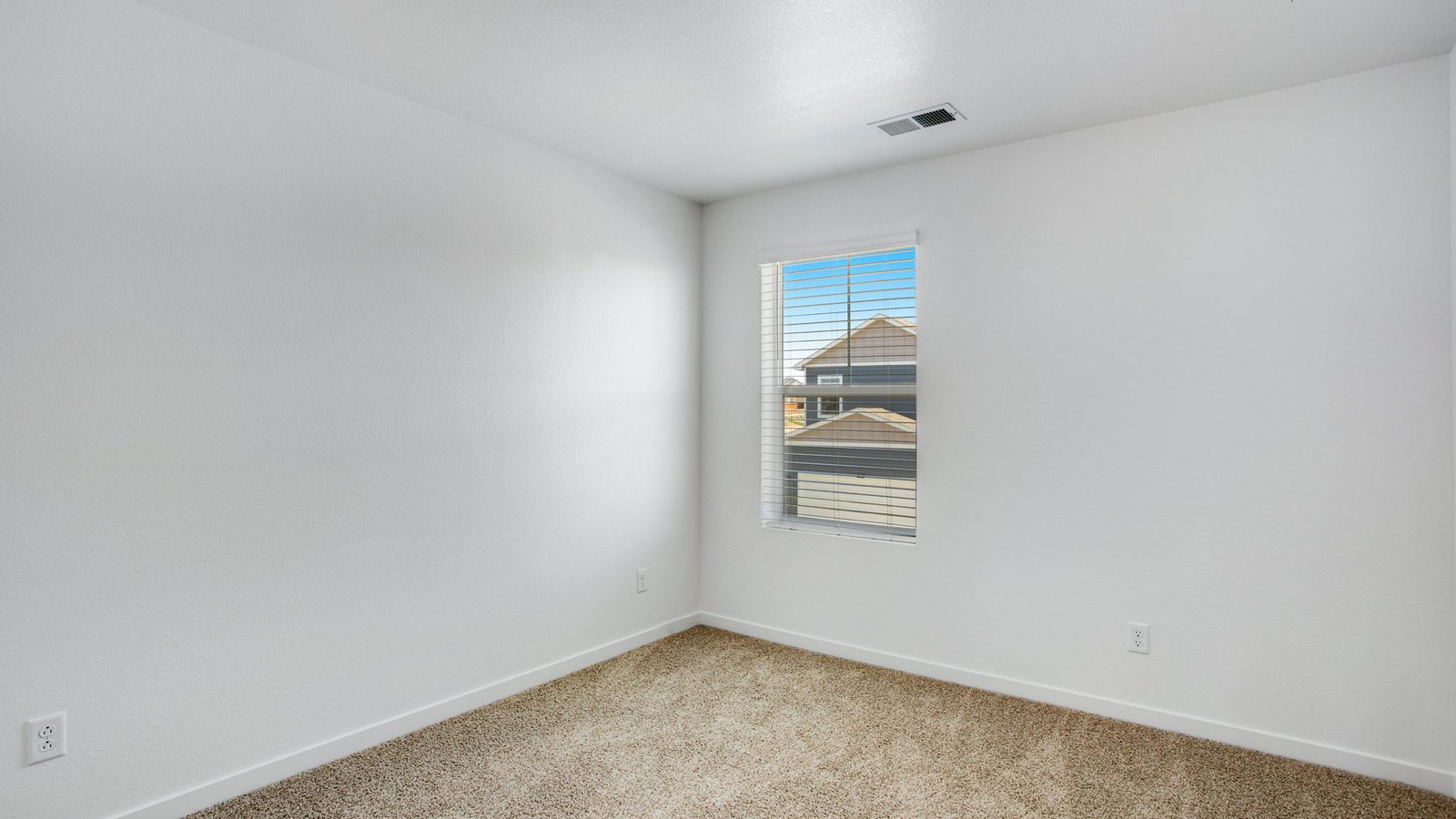 Secondary bedroom in new home community near Aurora Colorado
