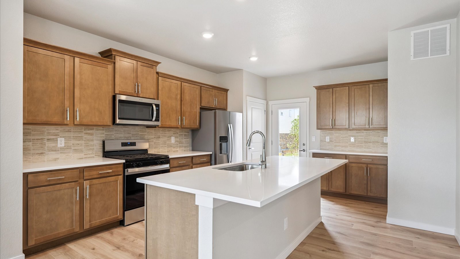Kitchen in new home floor plan by D.R. Horton