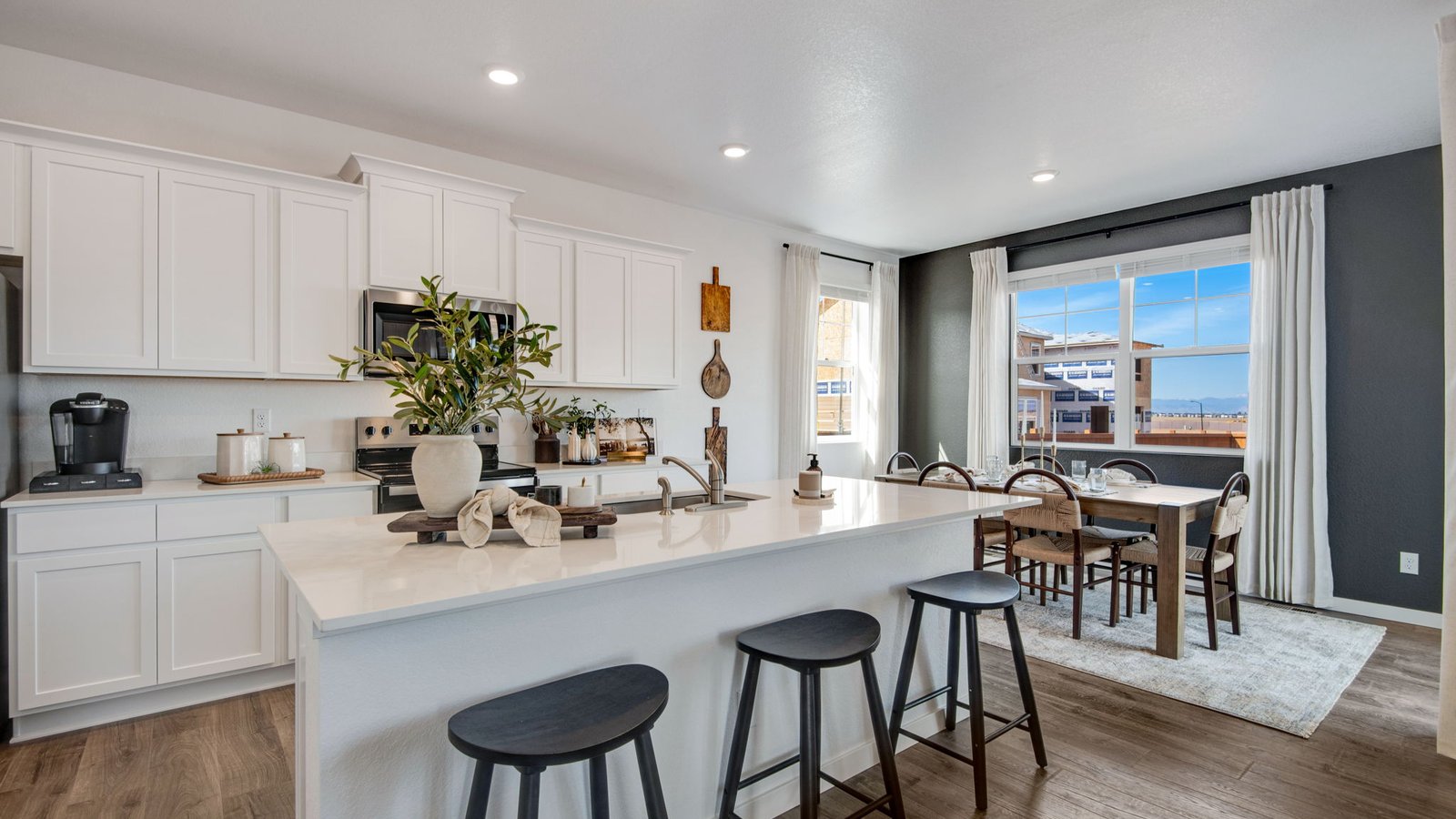 kitchen with white cabinets in new home