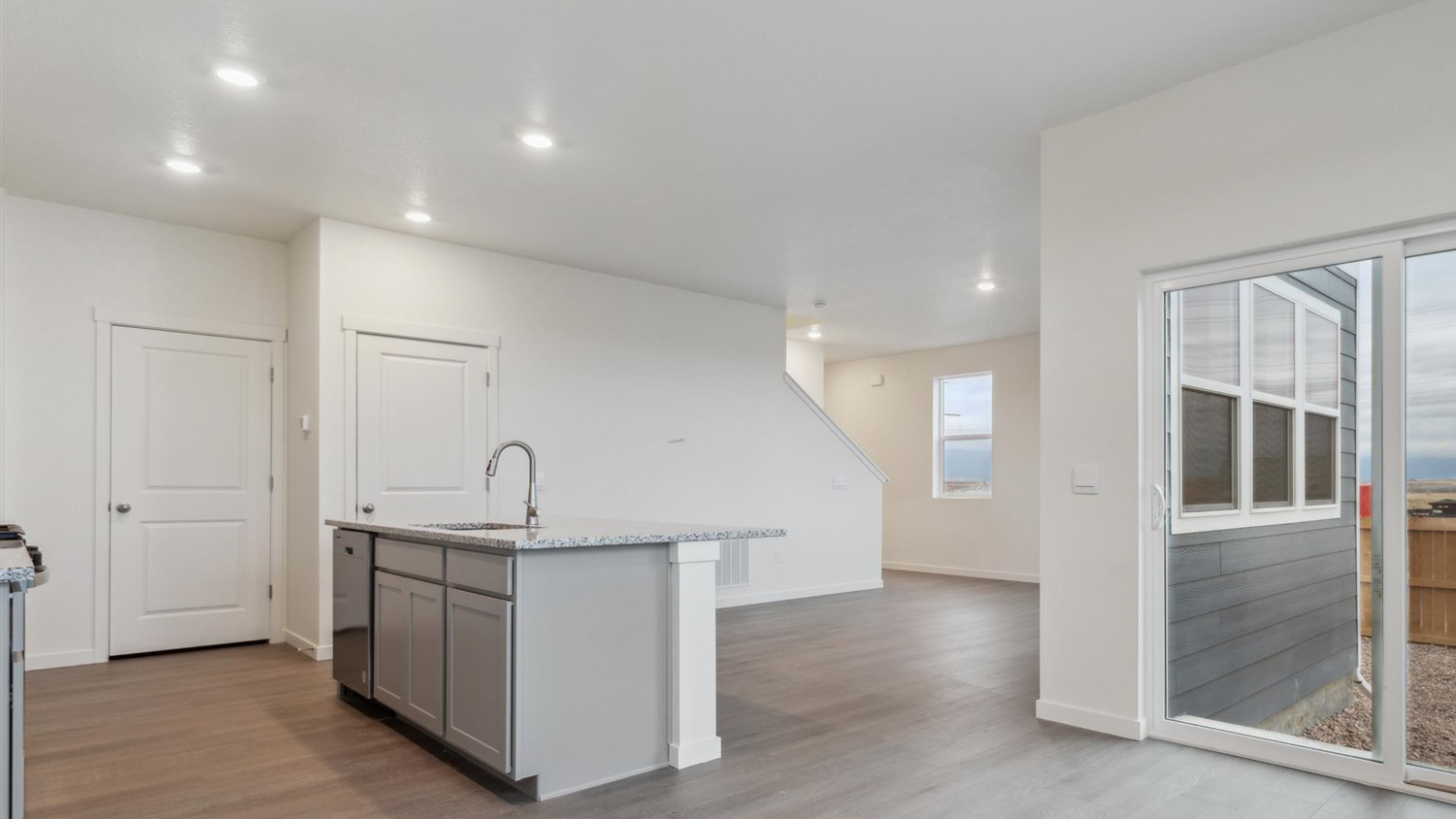 Spacious kitchen island perfect for entertaining in new home at Sky Ranch community