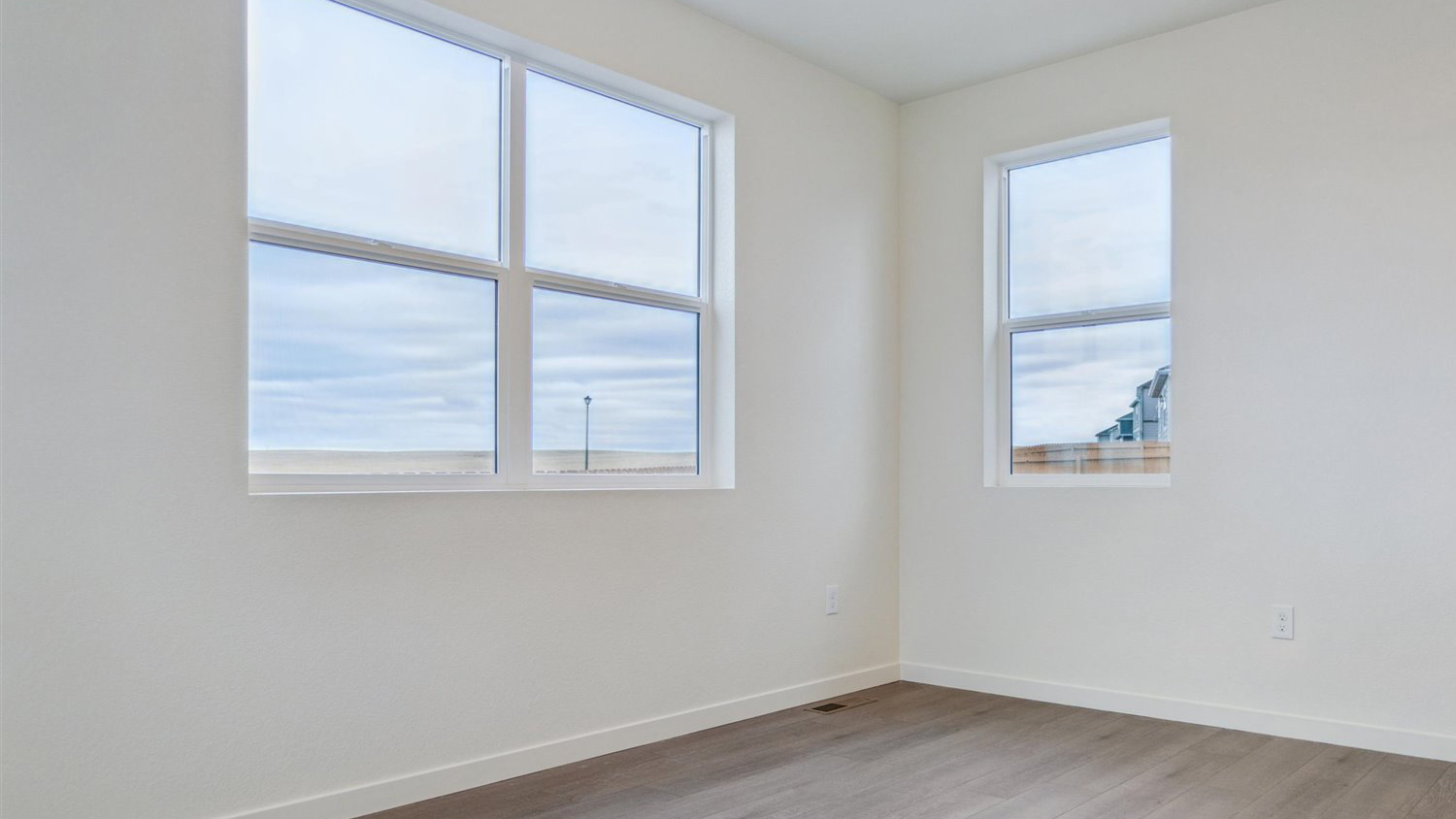 Secondary bedroom of new home Edmon floor plan in Colorado