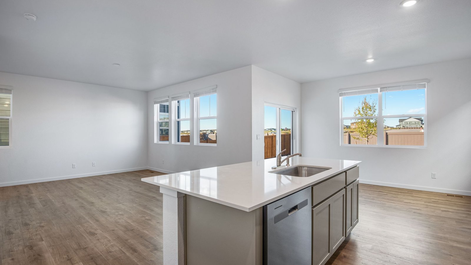 Spacious kitchen island in new home at Sky Ranch community in Colorado