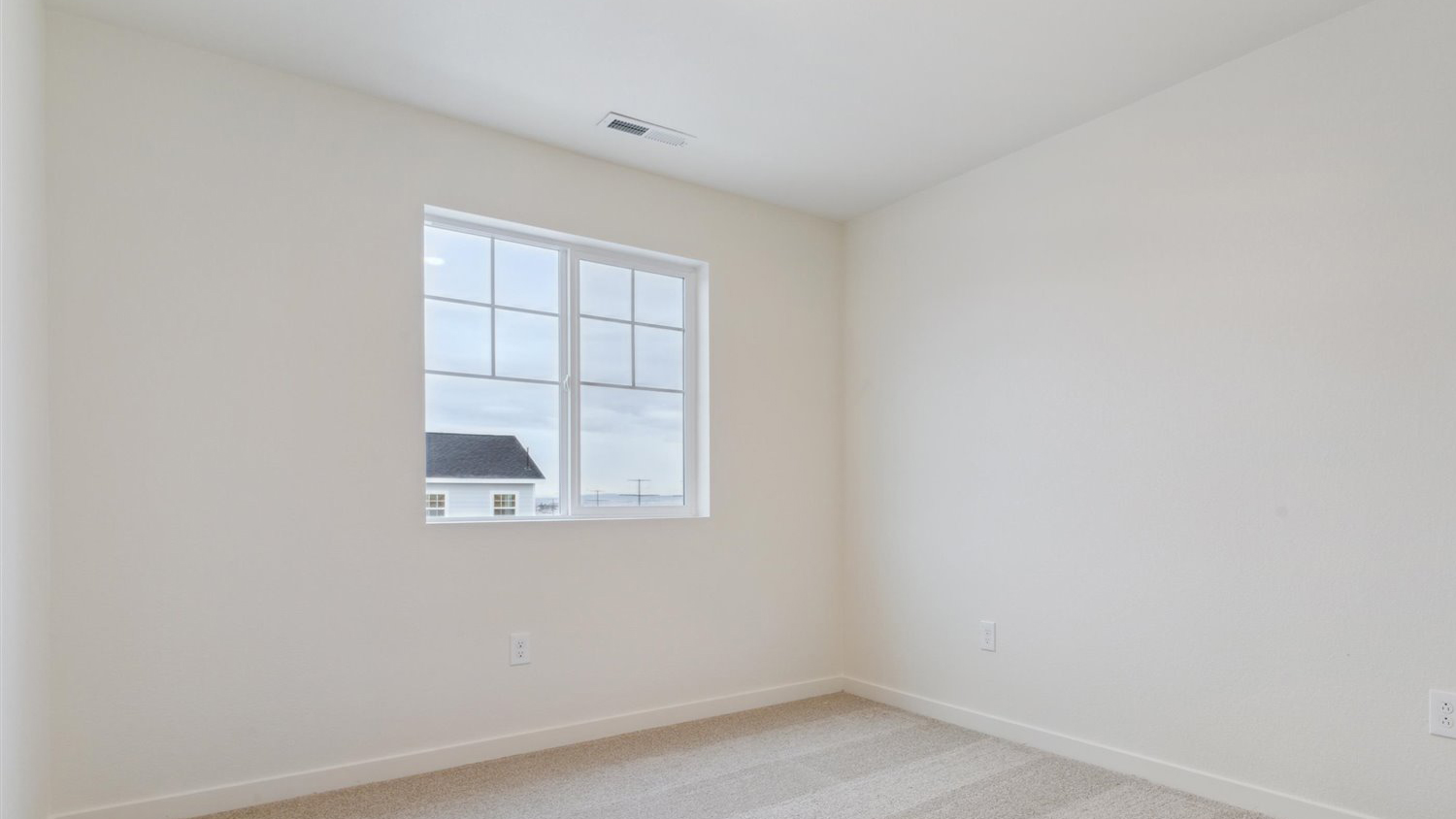 Secondary bedroom in new home community in Watkins Colorado