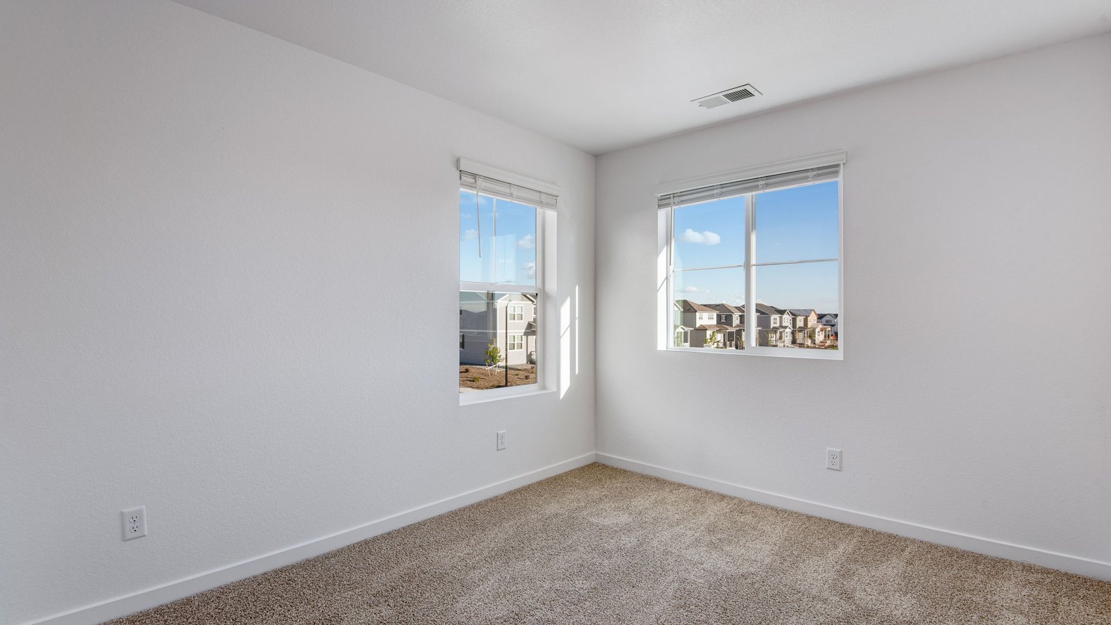 Secondary bedroom in new home in Watkins Colorado