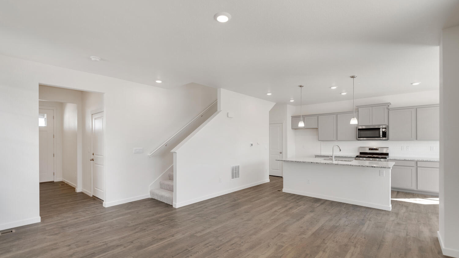 Open concept layout in new Pine floor plan at Sky Ranch community