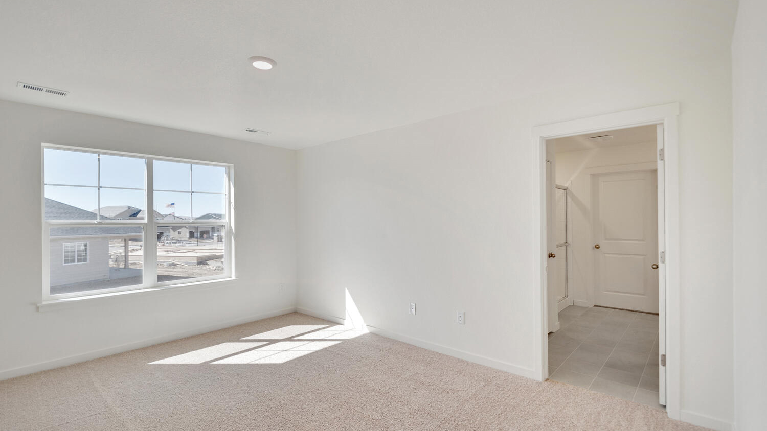 Large windows in Pine floor plan of new D.R. Horton home in Watkins, Colorado
