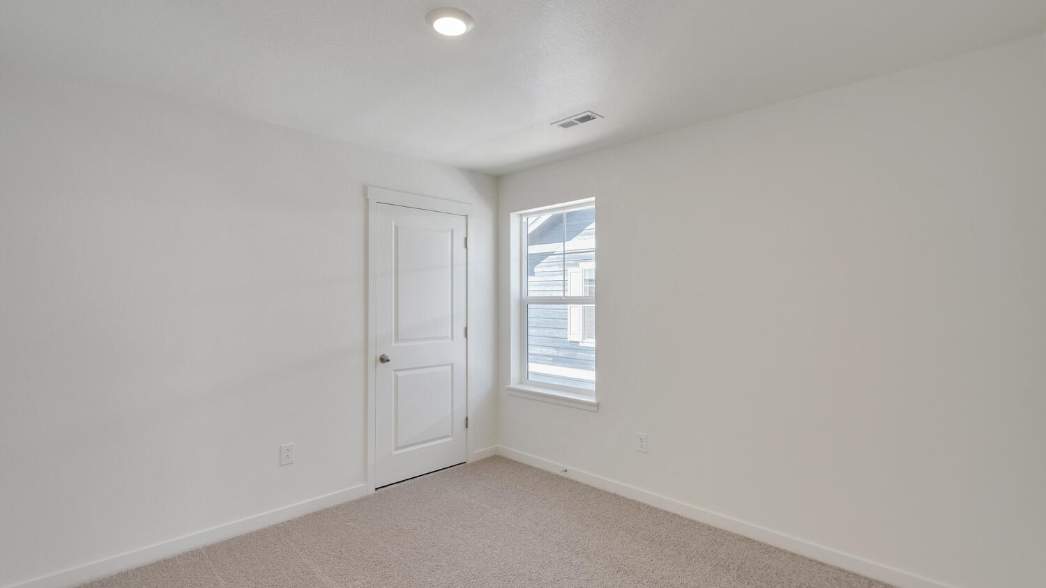 Secondary bedroom in Watkins Colorado new home