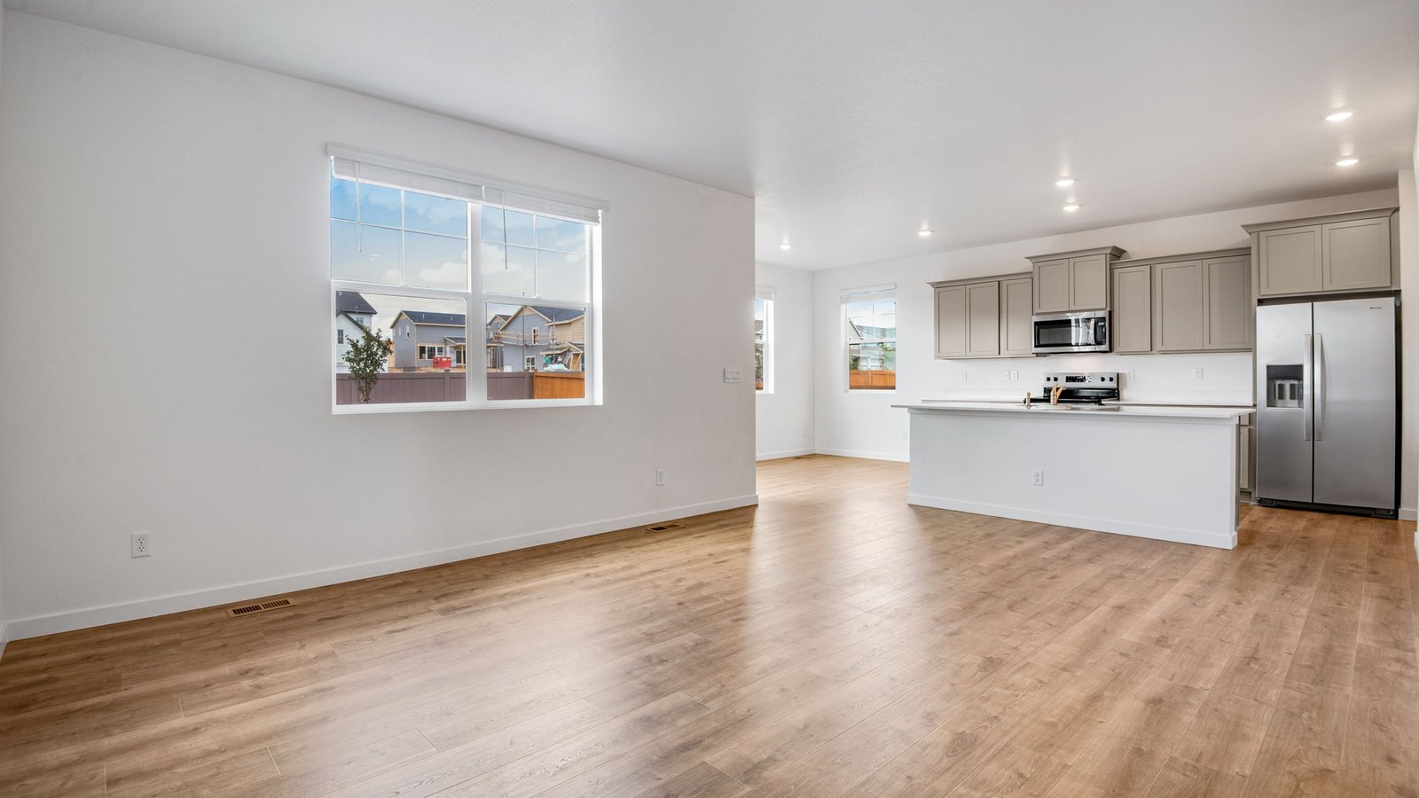 Living room with natural light in new D.R. Horton home in Denver Colorado