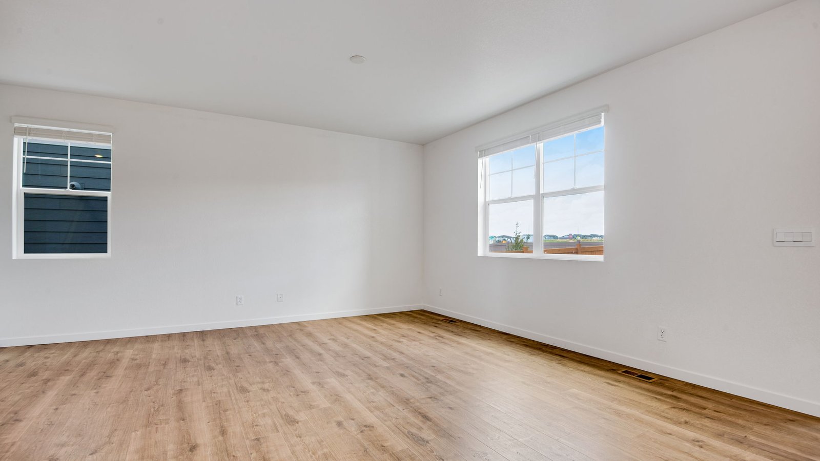 Living room with large windows in new D.R. Horton home in Arcadia Community