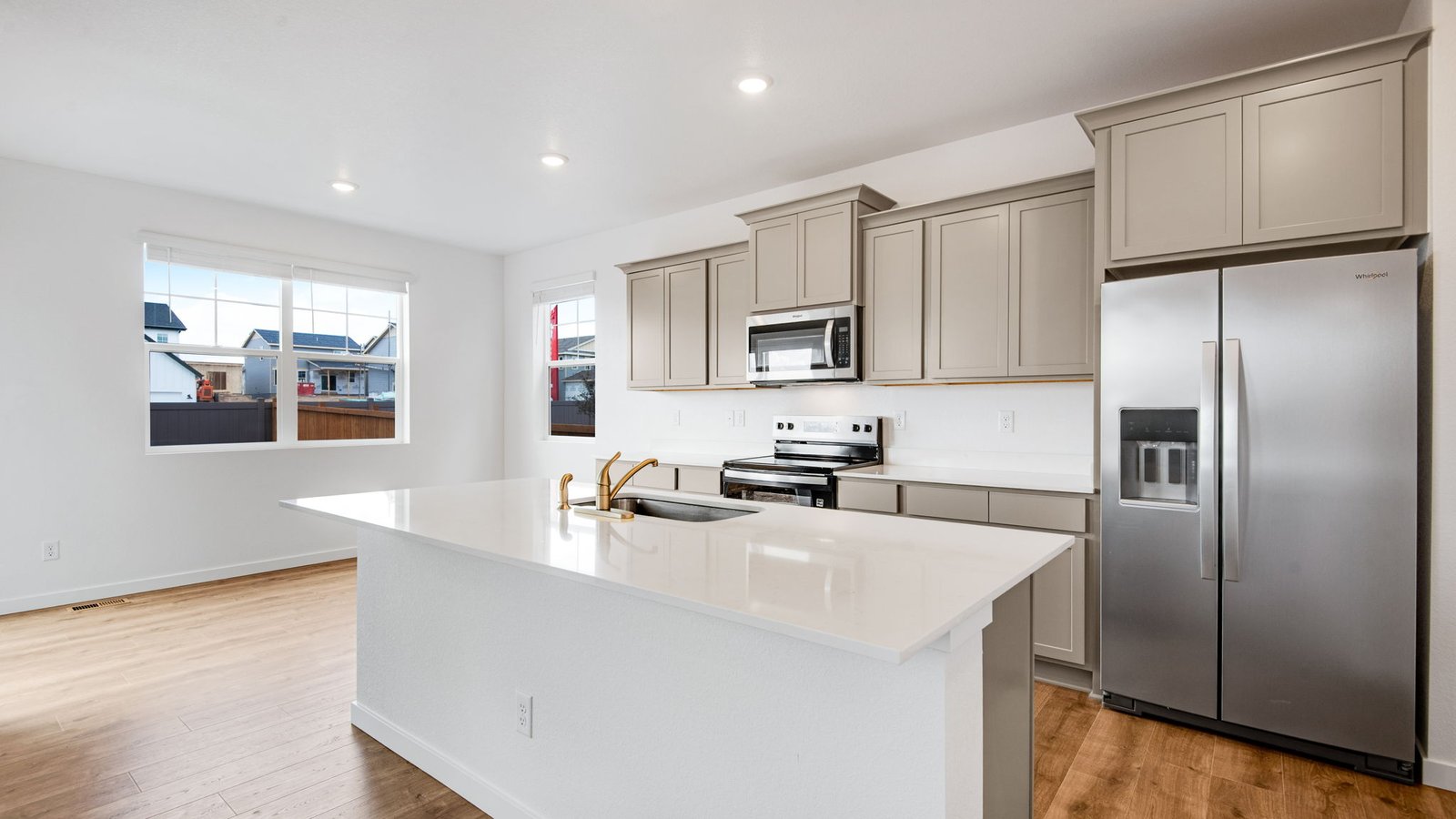 Spacious kitchen with stainless steel appliances in Arcadia Community in Denver Colorado