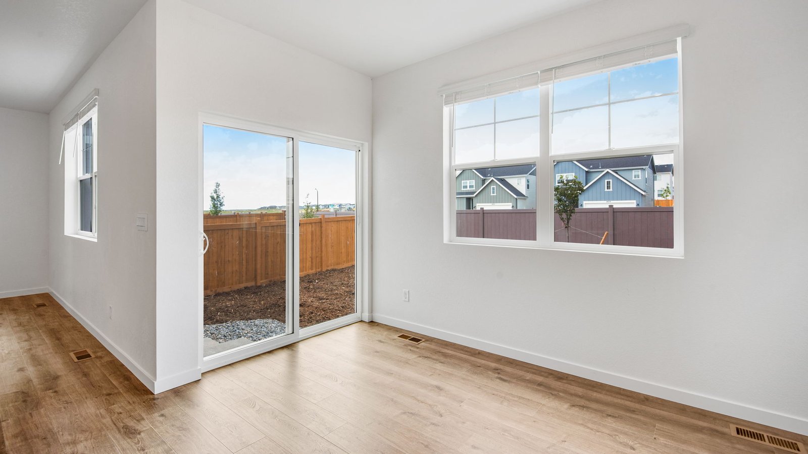 Dining room with access to the backyard in Pine floor plan