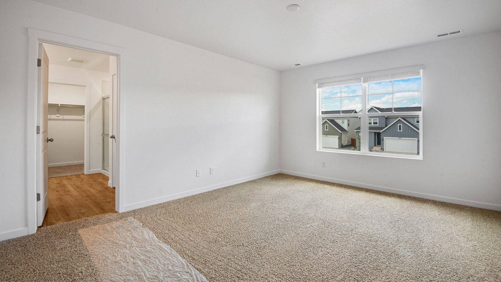 Primary bedroom in Pine floor plan of new home in Denver