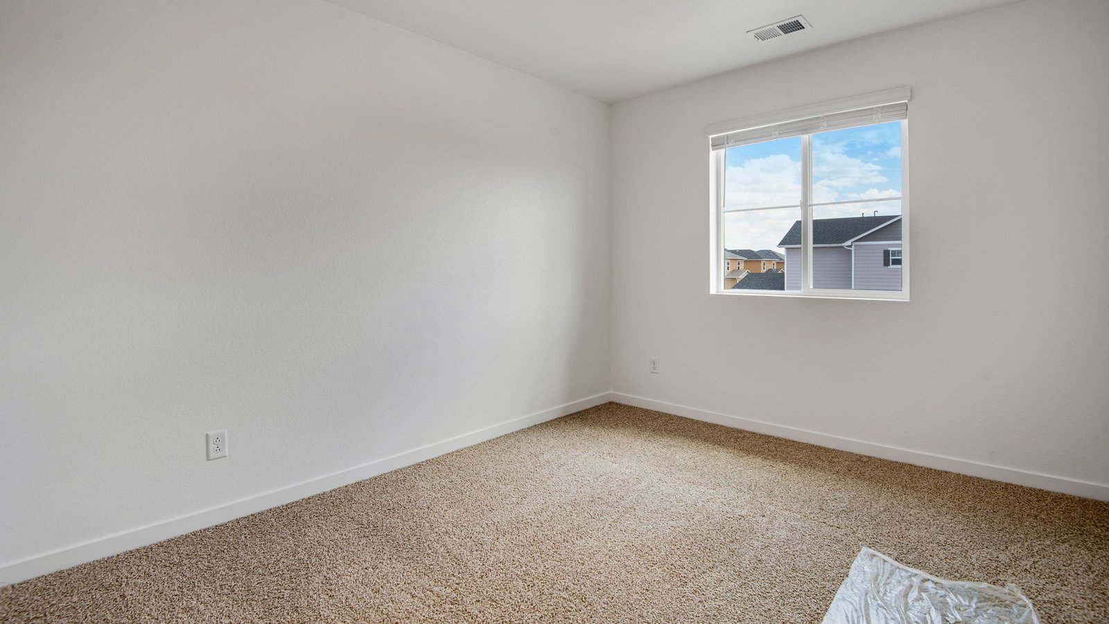 Secondary bedroom in Pine floor plan of new home in Denver