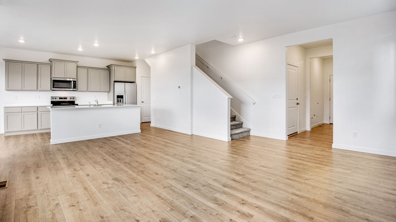 Open concept main level in new home at Arcadia Community in Denver Colorado