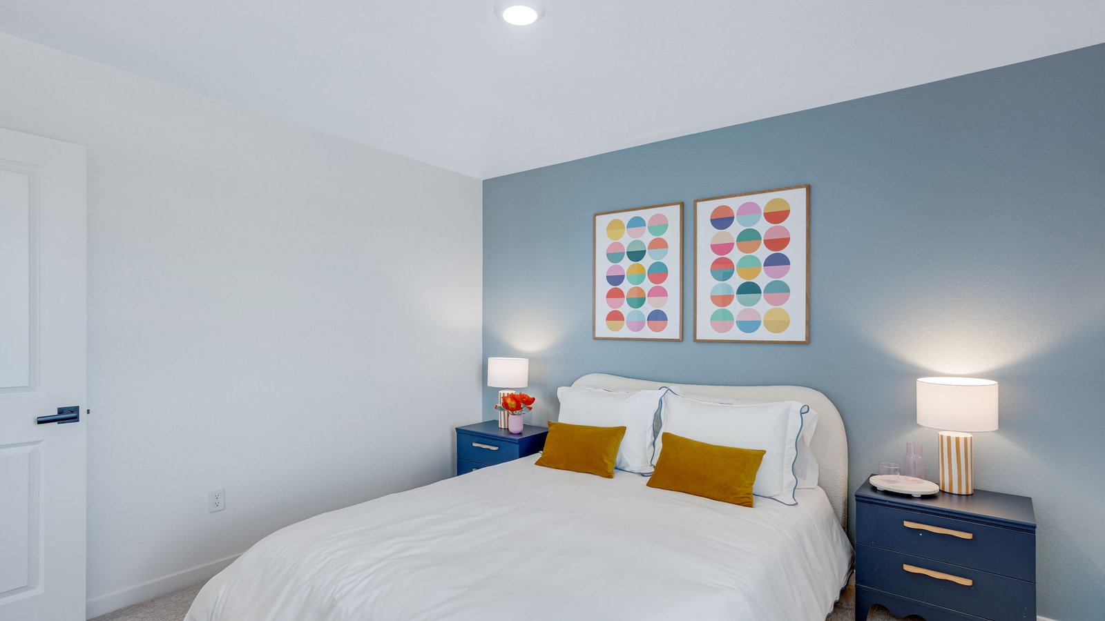 guest bedroom in new model home by d.r. horton colorado