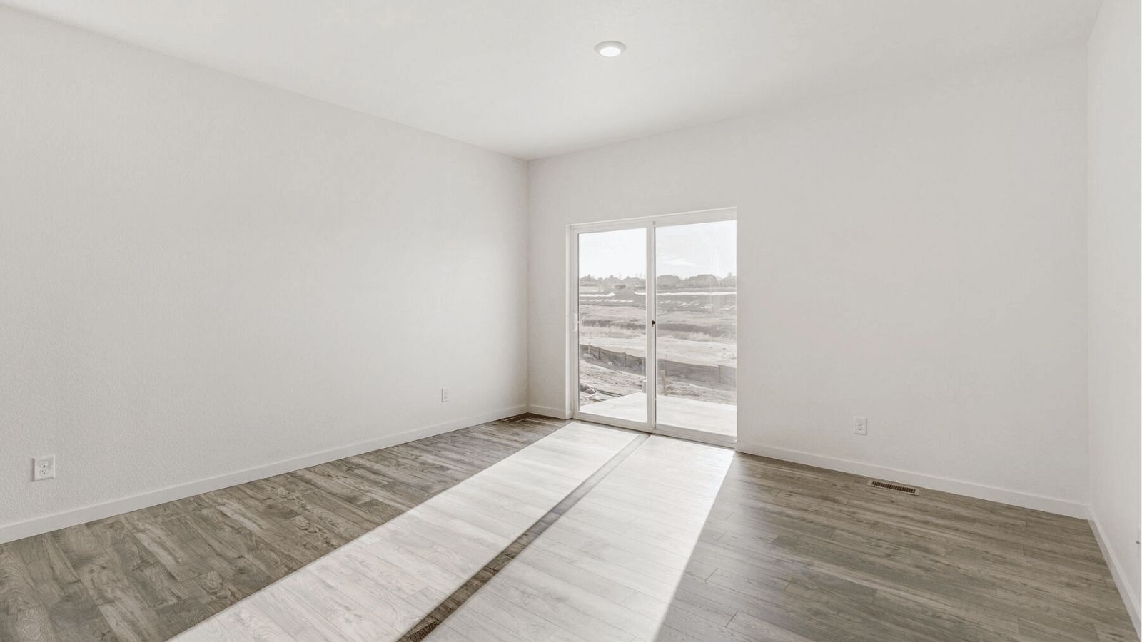 Living room in the Elm at Sky Ranch featuring an open layout and comfortable gathering space.