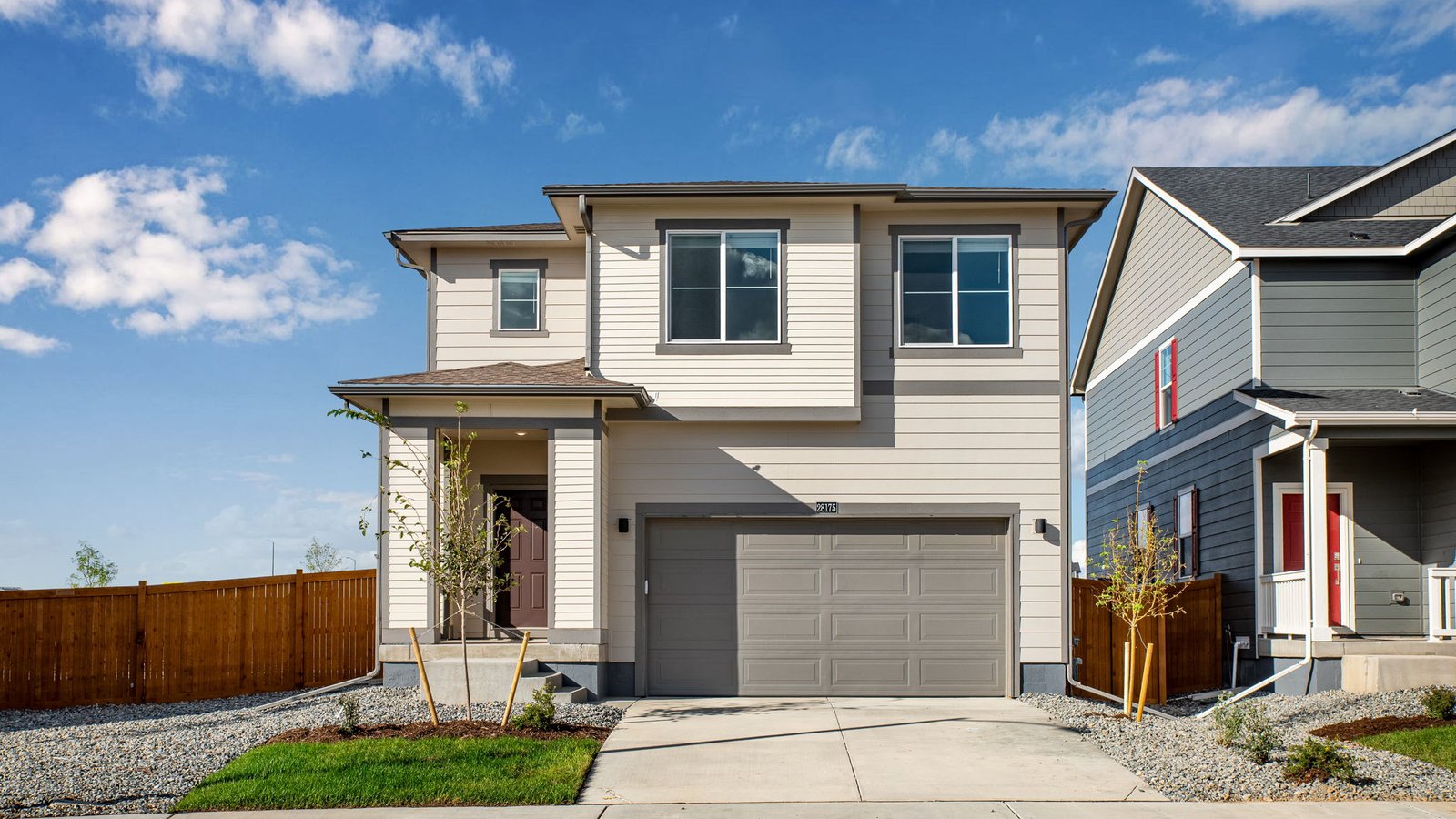 Exterior of two story Elm floor plan at new home community Sky Ranch