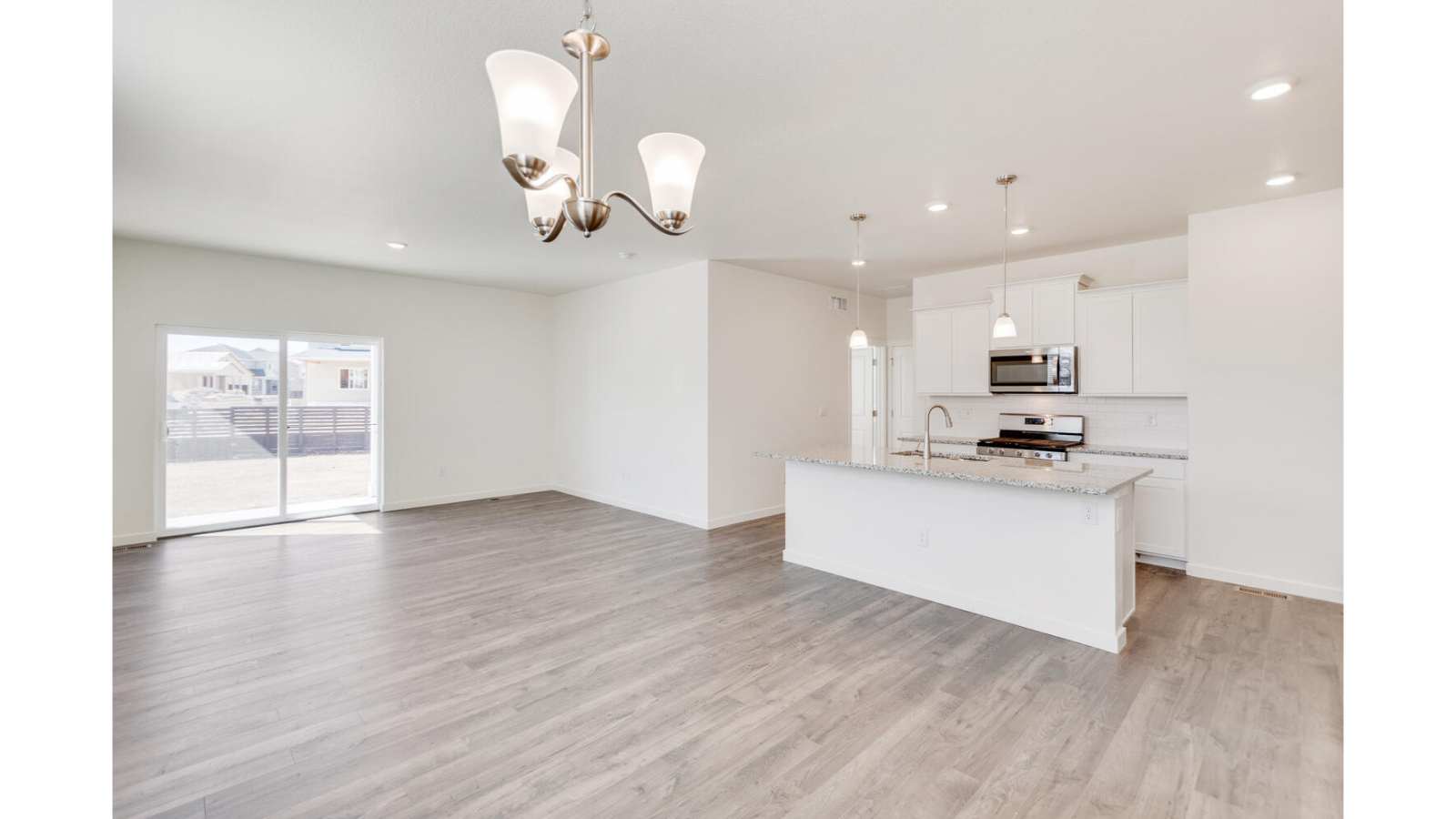 Open concept main floor layout in new home in Watkins, Colorado