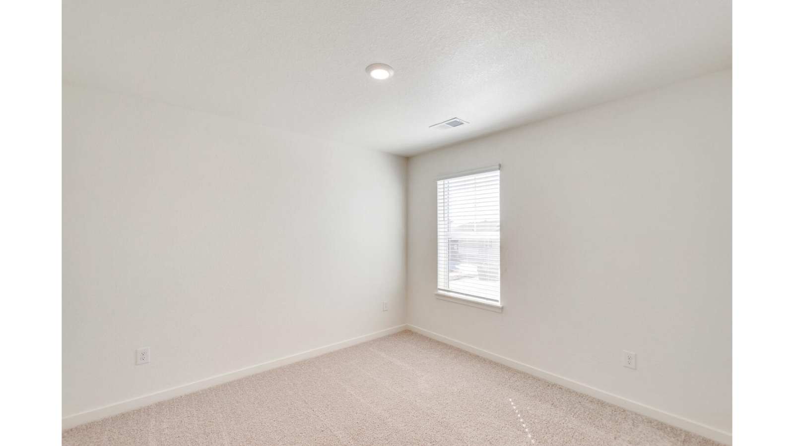 Secondary bedroom in new D.R. Horton home at Sky Ranch Community