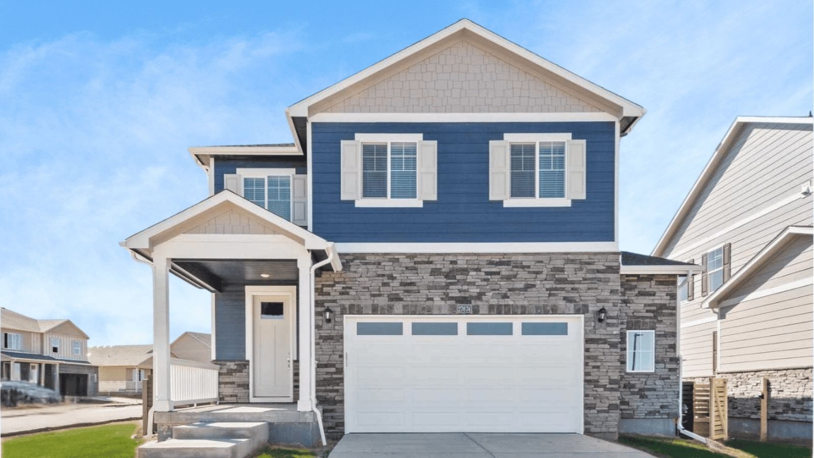 Exterior of two story home in Sky Ranch new home Community