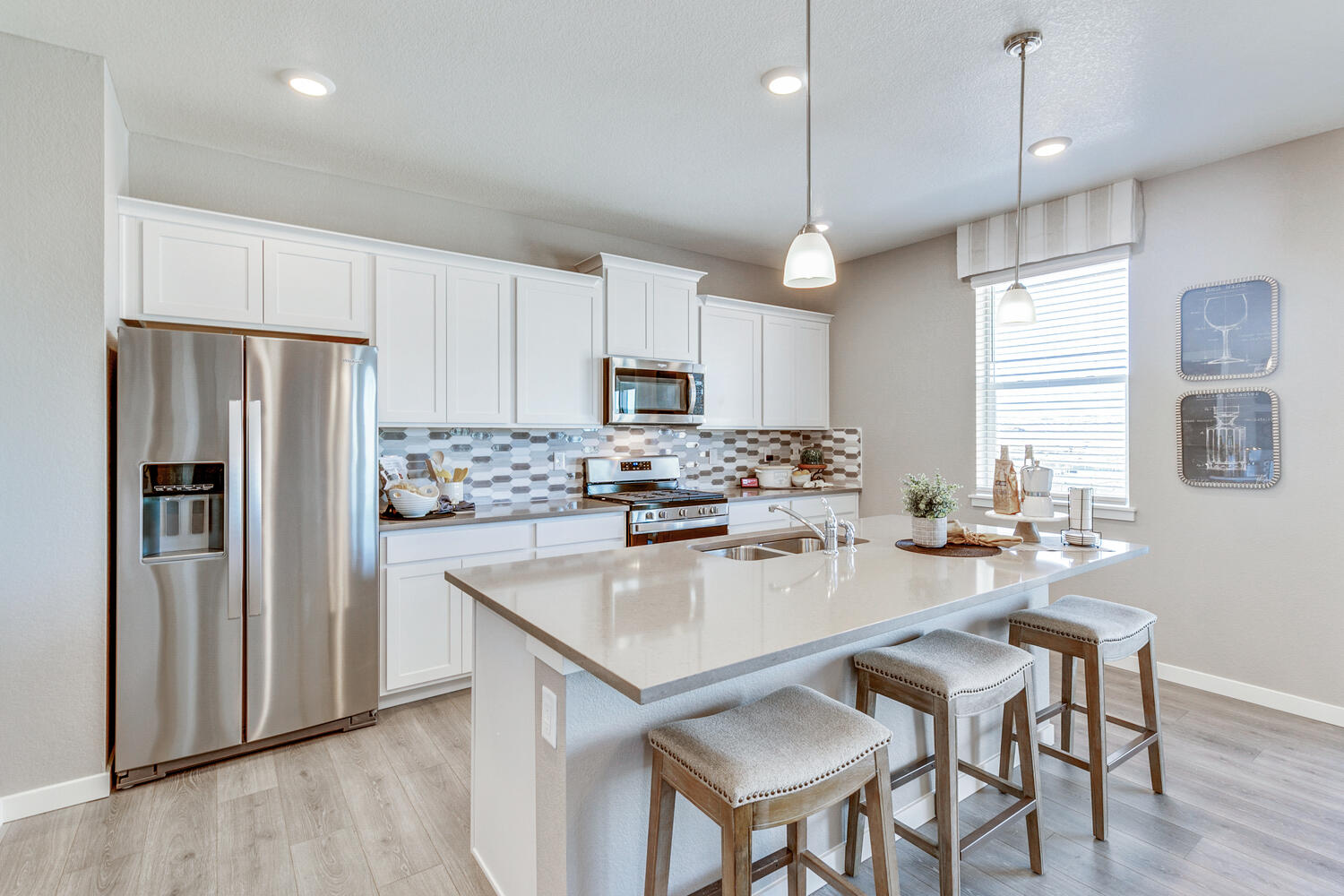 Kitchen with two pendant lights above island