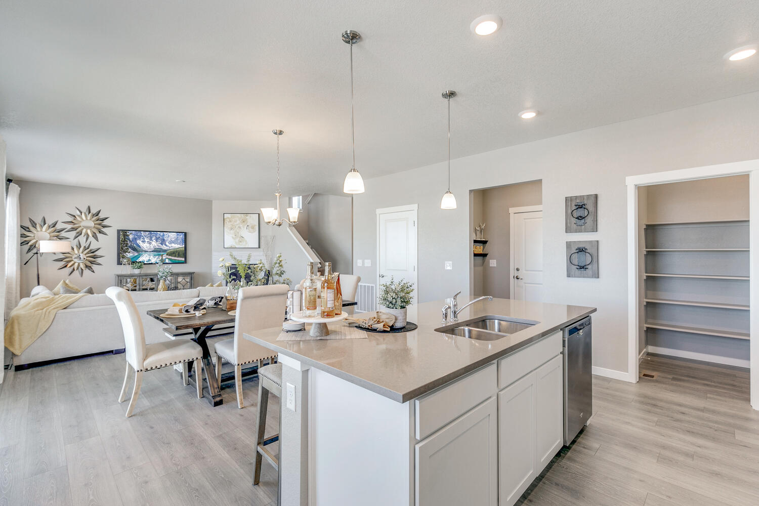 Alternate view of kitchen island overlooking open concept layout of Bridgeport first floor