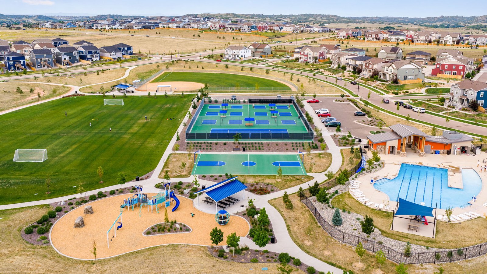 Playground, sport courts and pool amenities available at Trails at Crowfoot community by D.R. Horton in Parker, CO