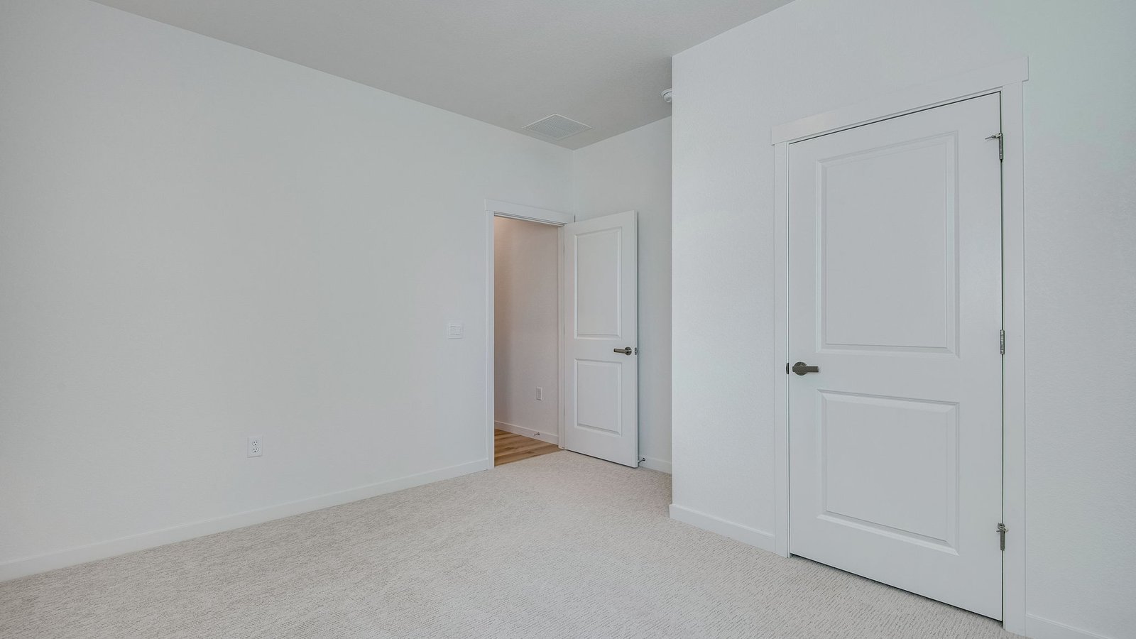 Second bedroom in new home by D.R. Horton