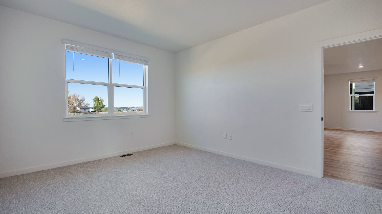 Primary bedroom in ranch home