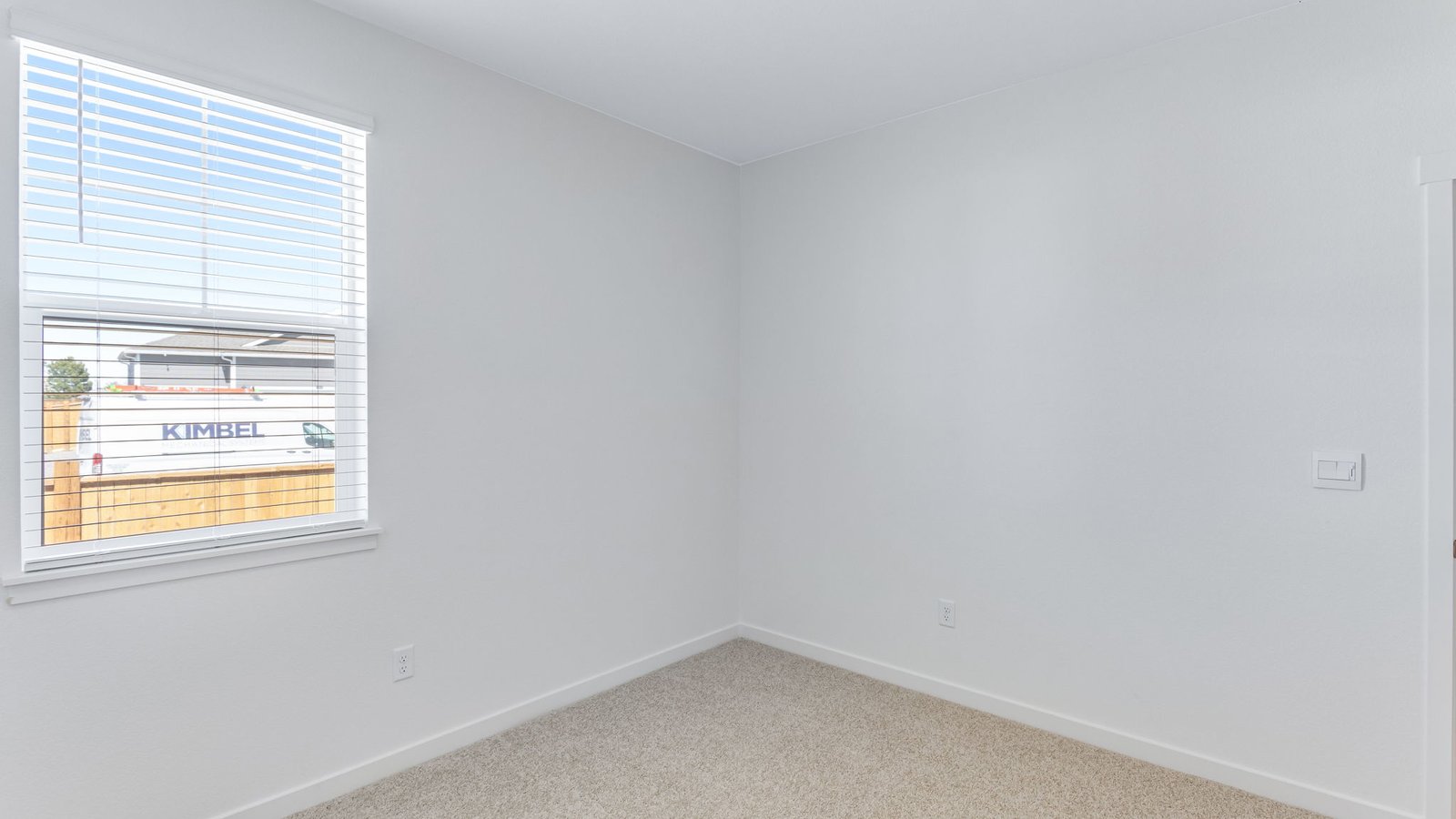 Secondary bedroom with natural light at Trails at Crowfoot community