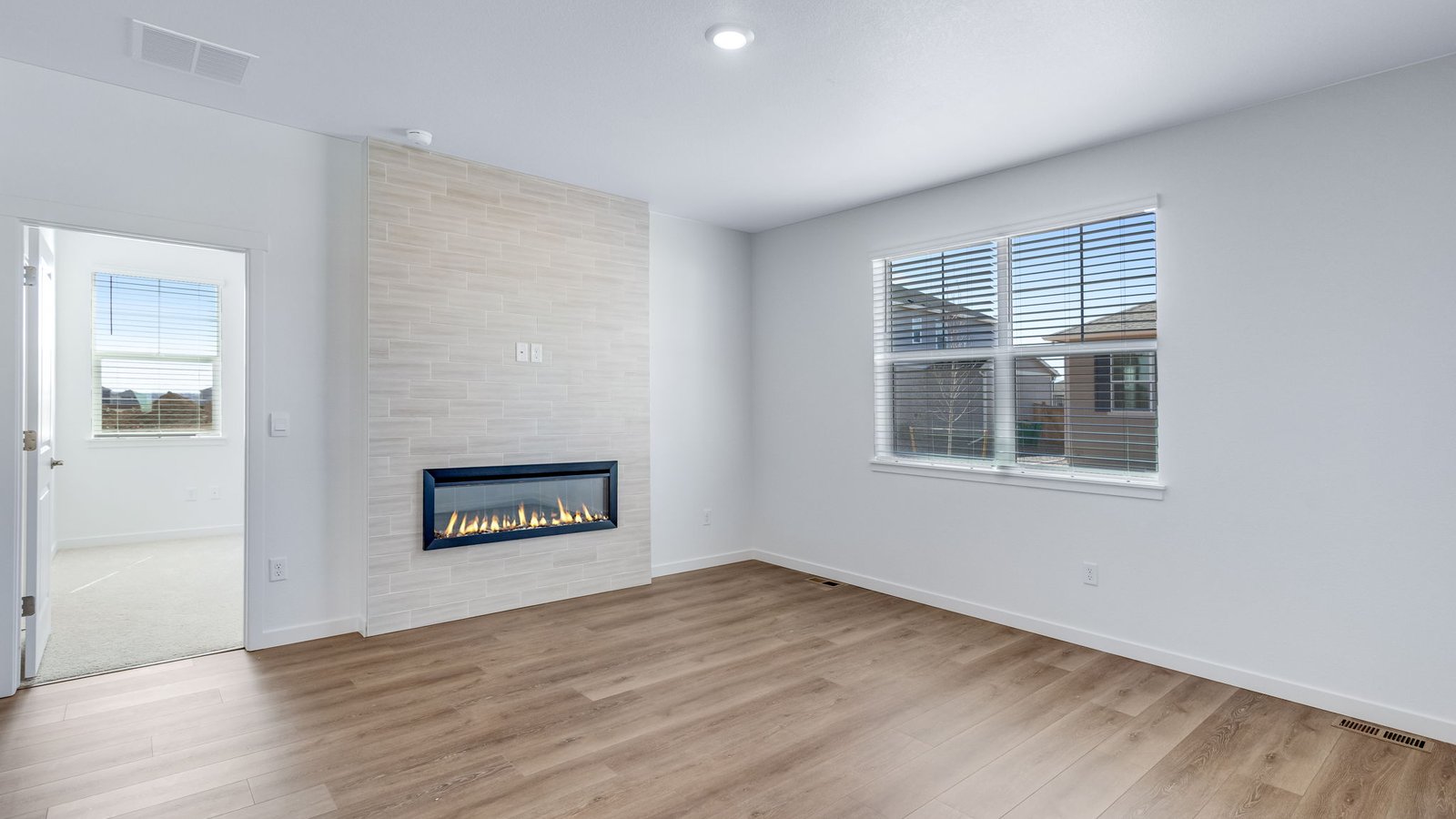 Great room in Chatham floor plan with fireplace